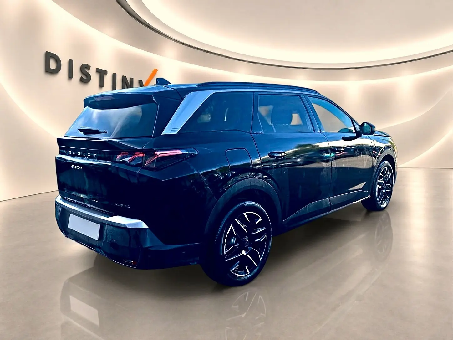 Peugeot 5008 Hybrid 145 GT noir, vue 3/4 arrière droit, jantes alu et feux arrière LED distinctifs.