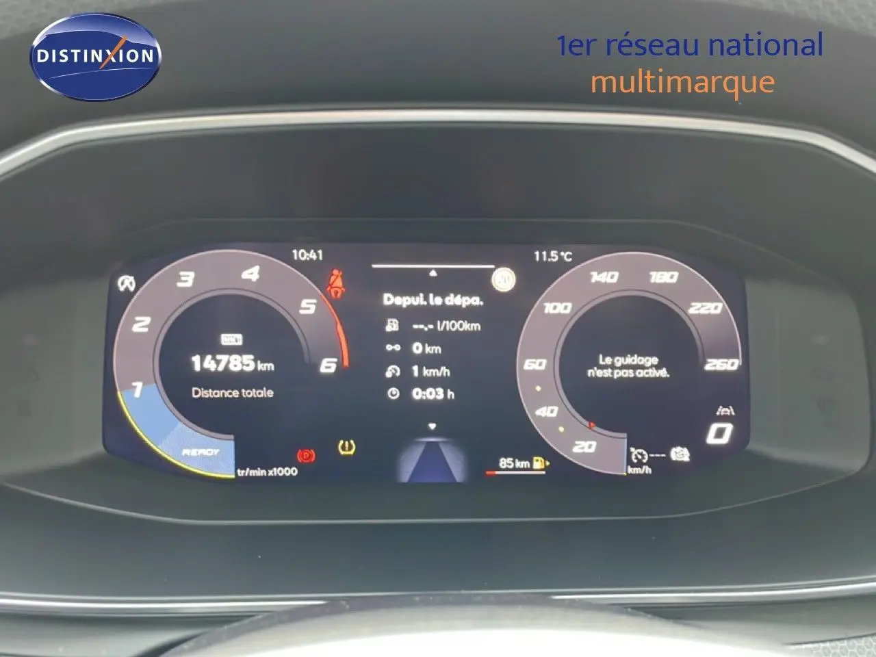 Tableau de bord numérique du SEAT LEON 2.0 TDI 115CH STYLE XL gris, affichant 14 785 km et informations de conduite.