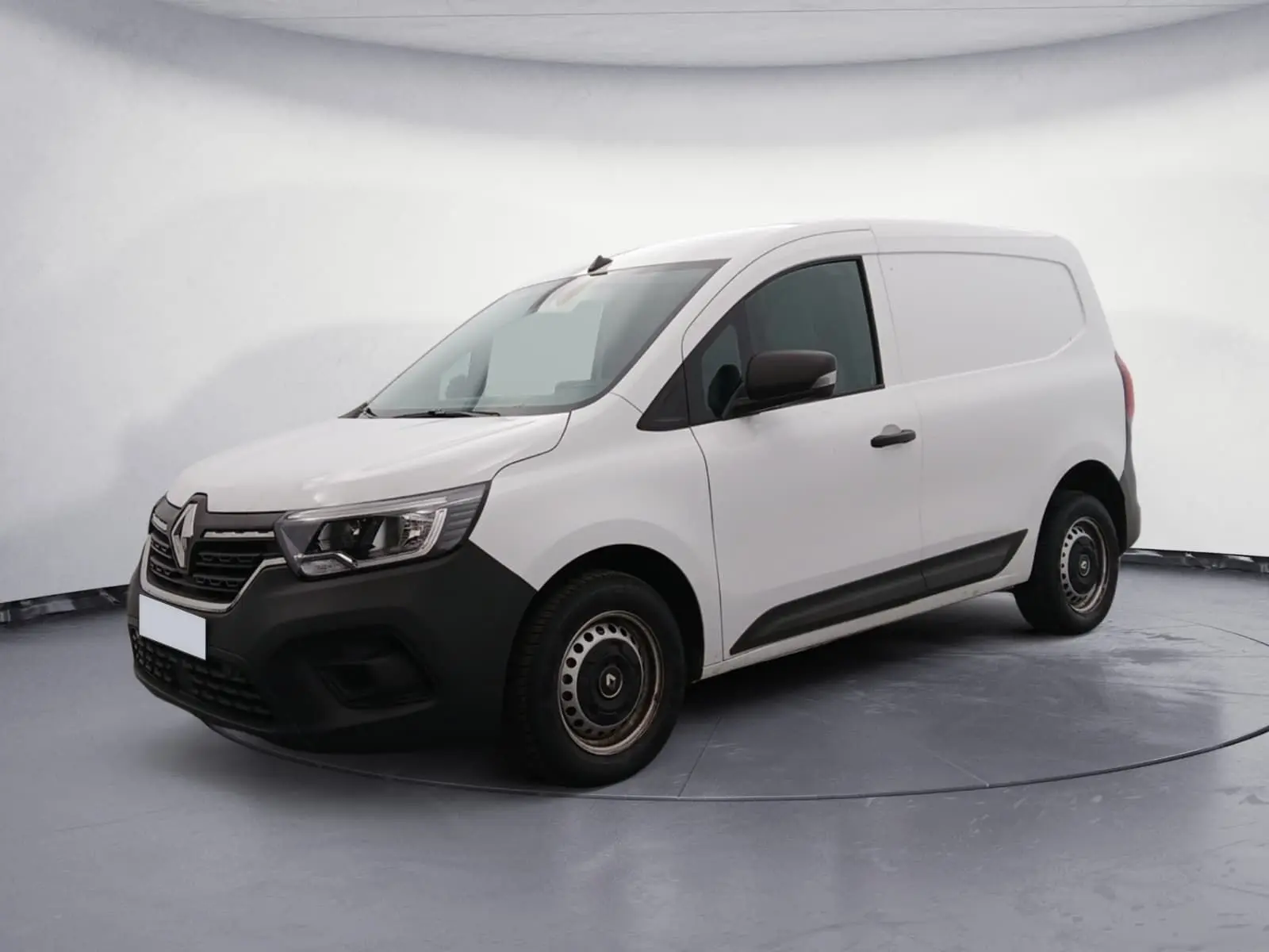 Renault Kangoo Van blanc en 3/4 avant droit, avec pare-chocs noir et jantes tôles noires simples.
