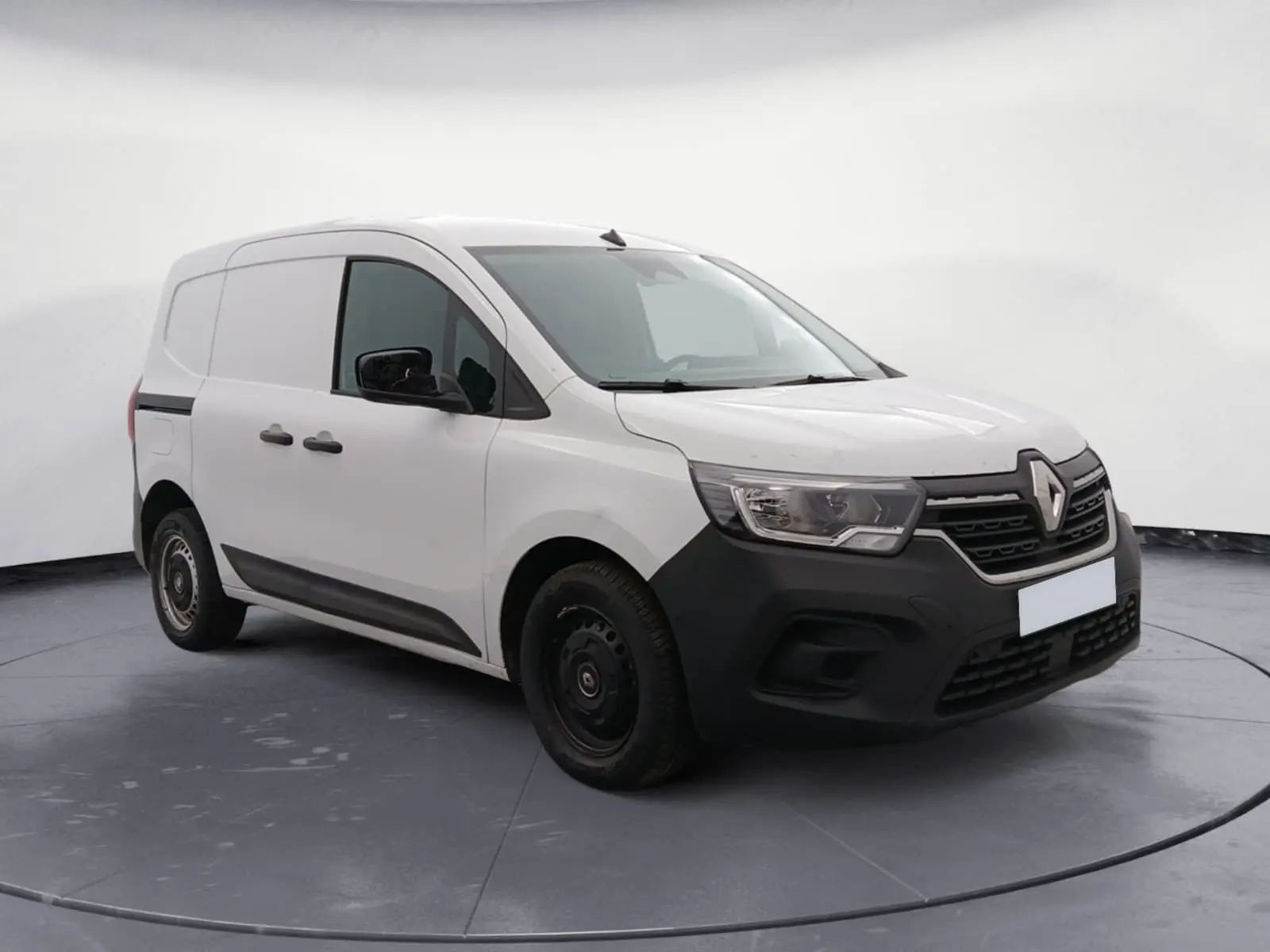 Renault Kangoo Van blanc en 3/4 avant droit, avec pare-chocs noir mat et jantes acier noires.