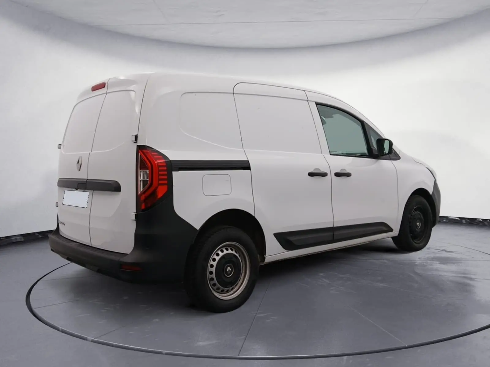 Renault Kangoo Van blanc en 3/4 arrière droit, avec éléments noirs contrastants et feux arrière LED distinctifs.