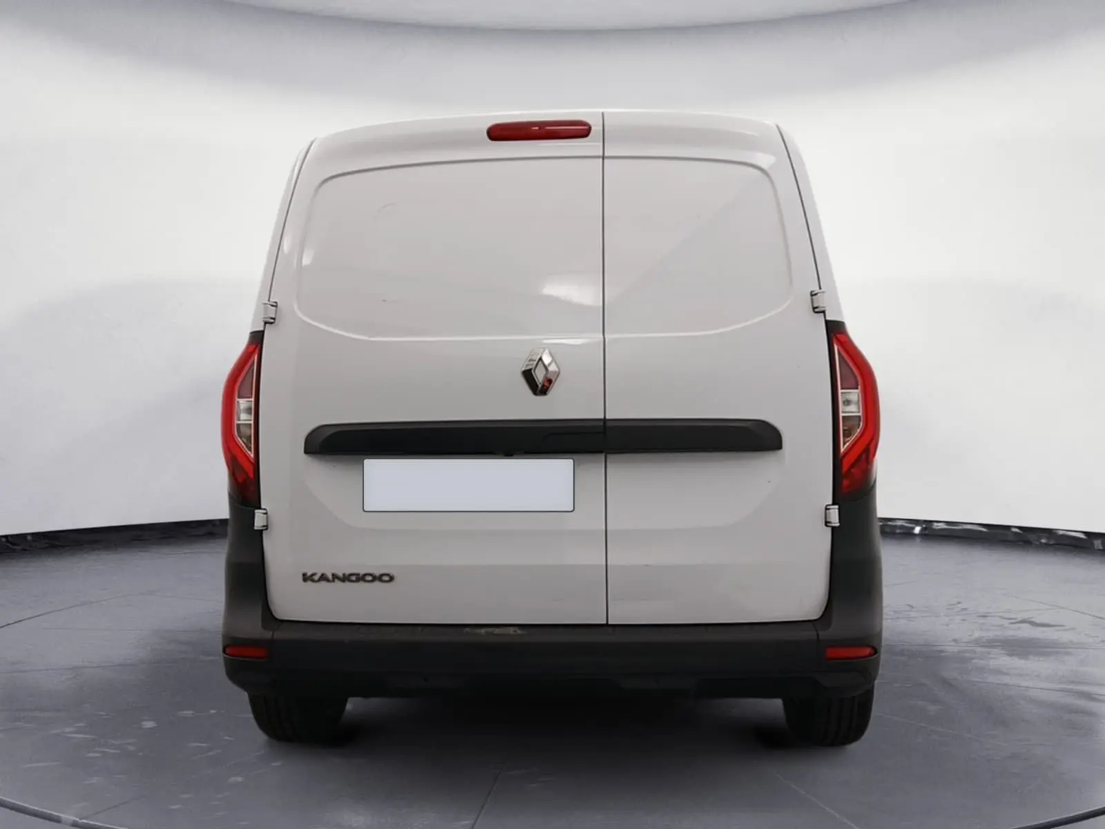 Vue arrière d’un Renault Kangoo blanc 2024 version Van 1.5 Blue dCi avec portes battantes et feux arrière rouges.