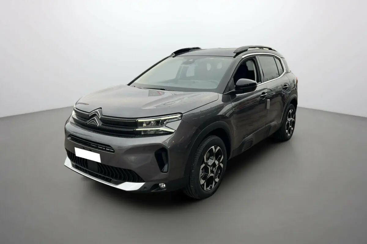 Citroën C5 Aircross BlueHDi 130 2025 gris platinium avec toit noir, vue 3/4 avant côté gauche.