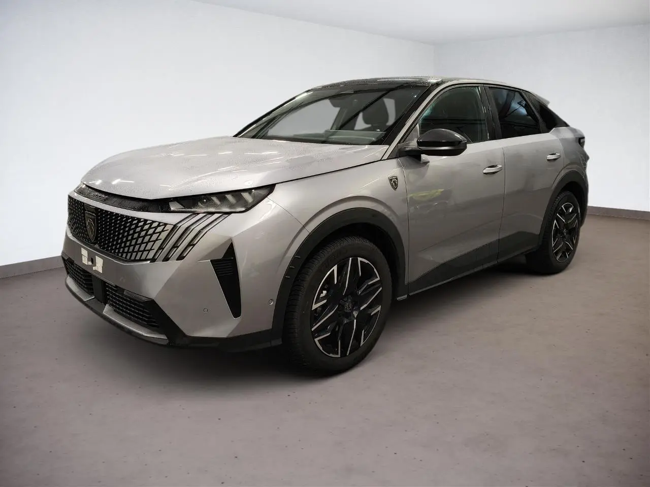 Peugeot 3008 Hybrid gris Artense en vue 3/4 avant droit, avec toit noir et jantes alliage noires diamantées.