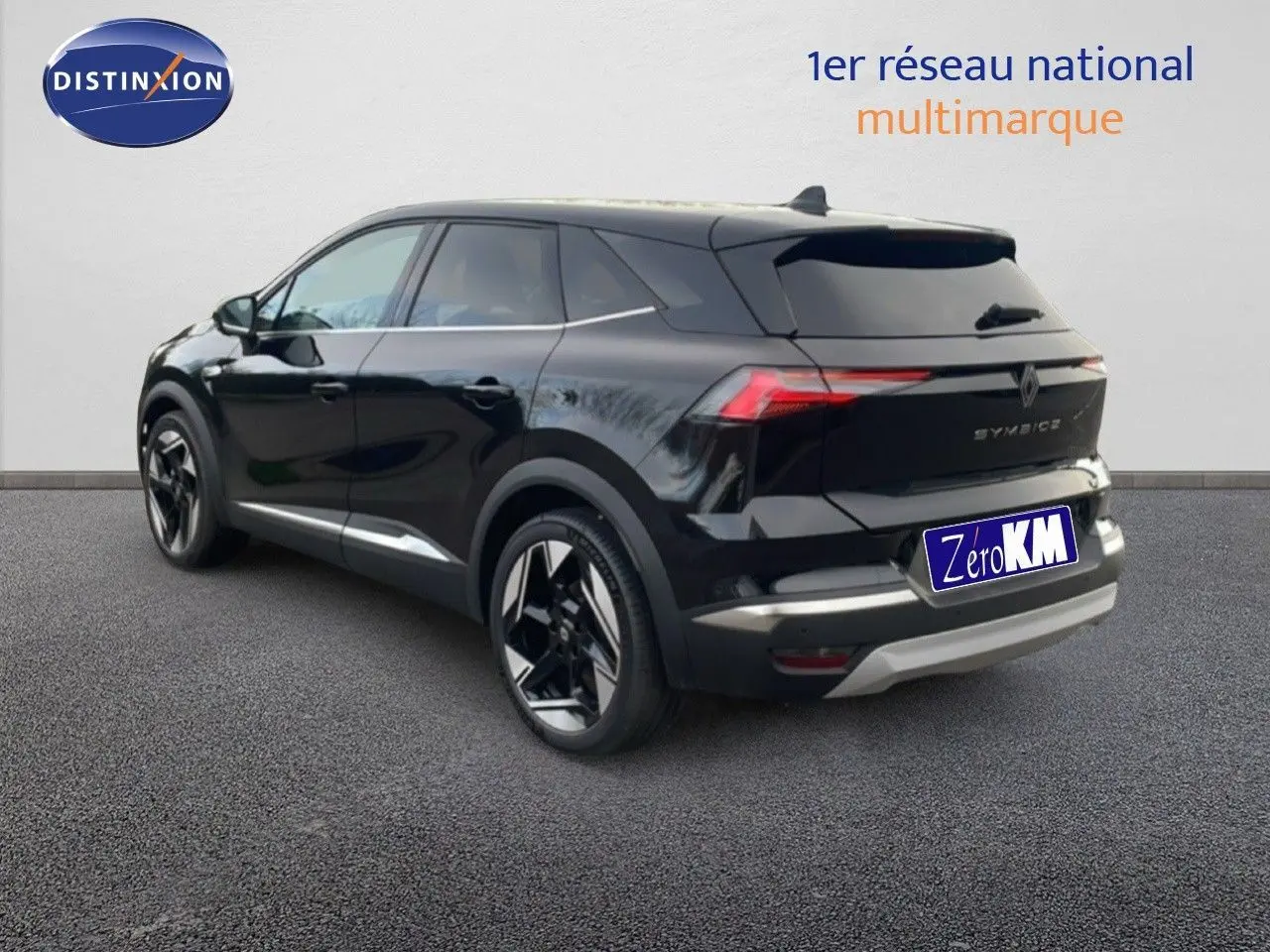 Renault Symbioz noir étoile métal en 3/4 arrière droit, SUV hybride avec jantes noires et détails chromés.