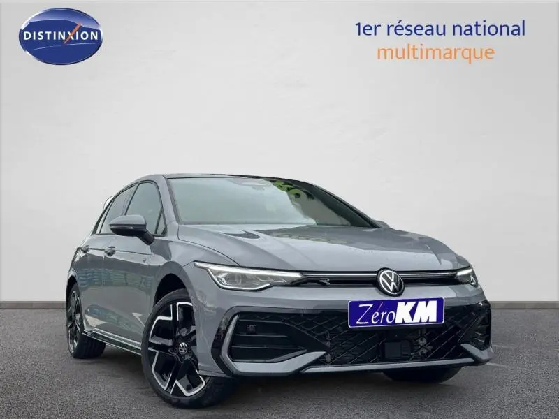 Volkswagen Golf 2.0 TDI R-Line gris vue 3/4 avant avec jantes sport noires et calandre distinctive.