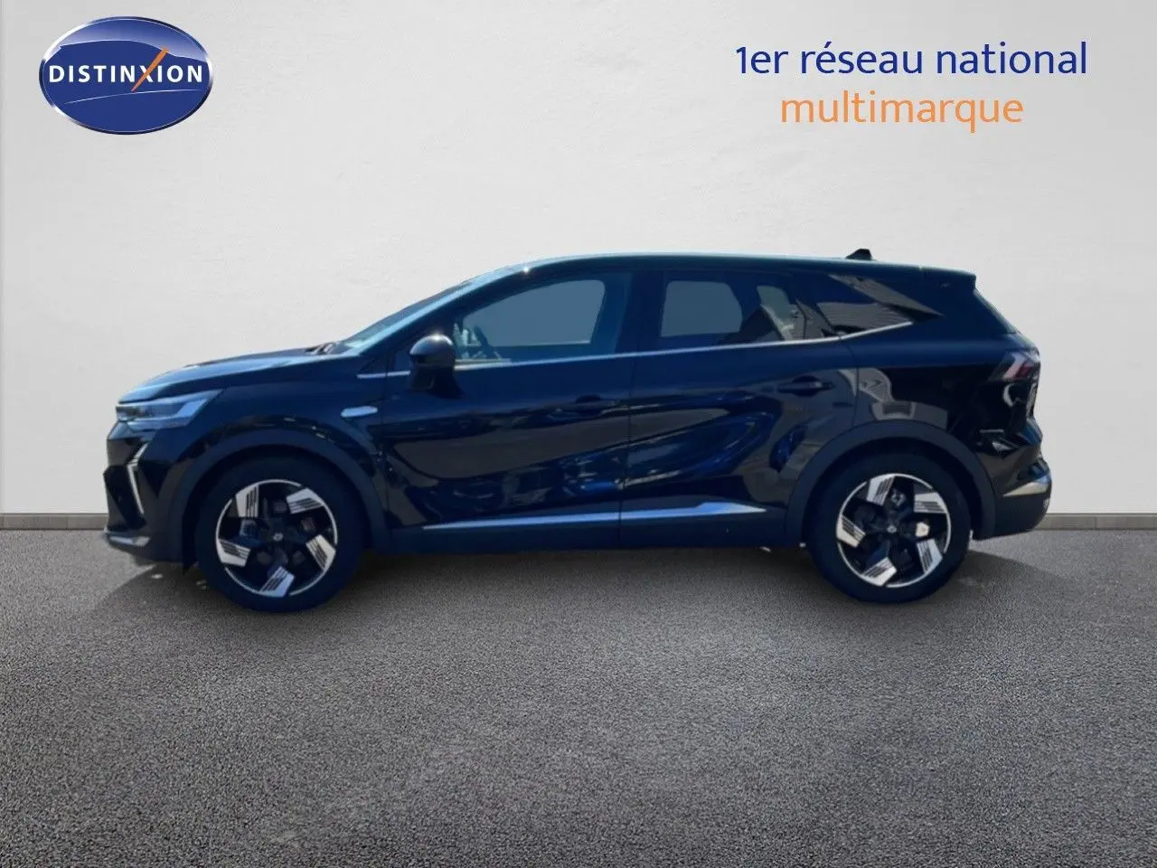 Profil latéral droit d'un Renault SYMBIOZ 2025 noir étoile métal avec jantes bi-ton et lignes sculptées.