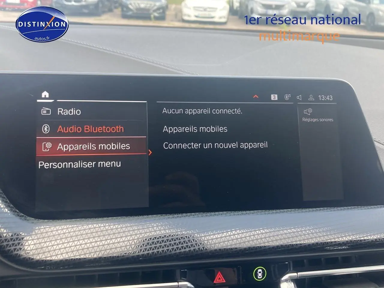 Écran central du BMW Série 1 F40 118i 2023 affichant le menu Bluetooth et appareils mobiles, intérieur noir.