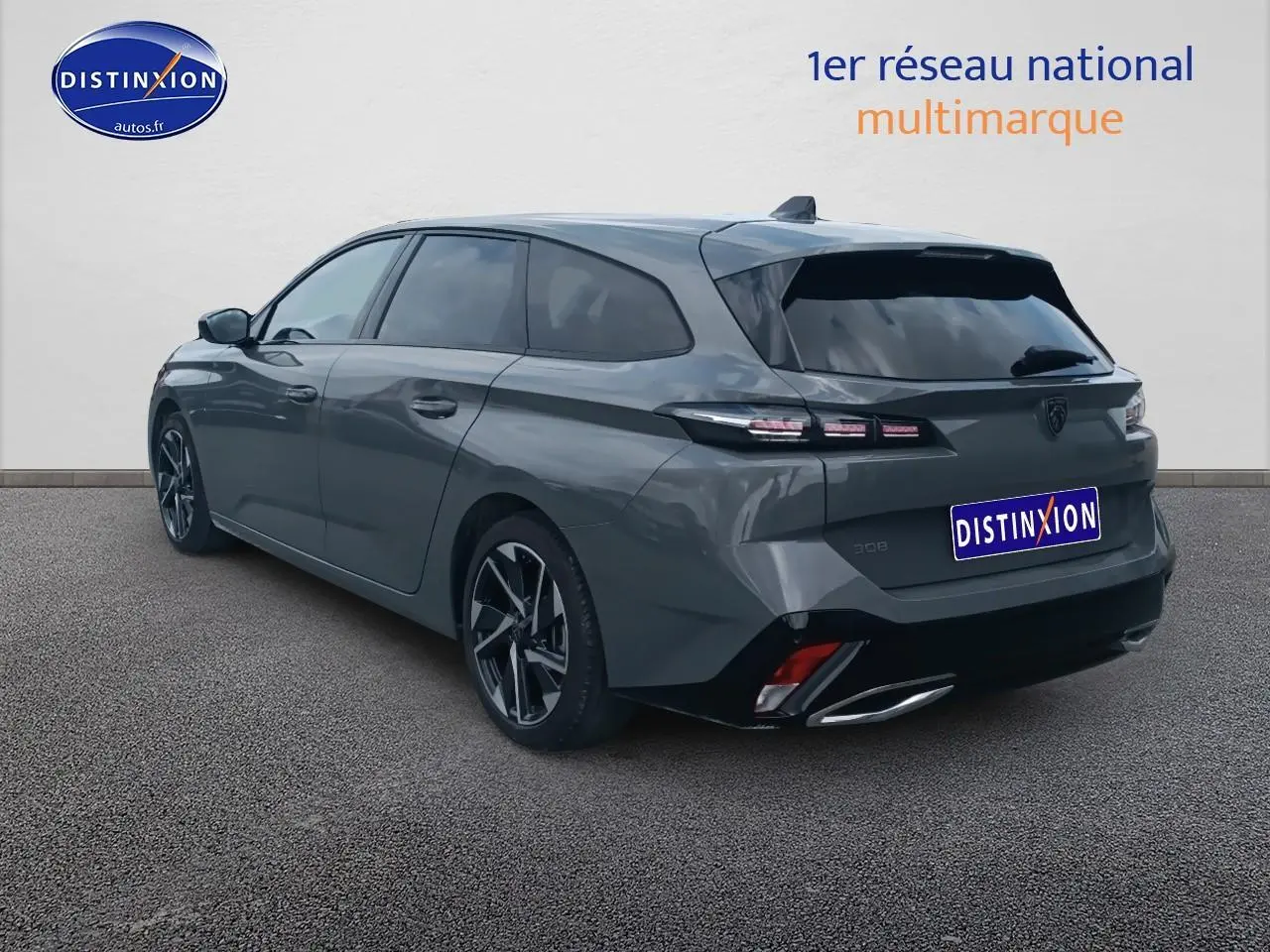 Peugeot 308 SW gris sellenium vue 3/4 arrière droit avec jantes alliage et vitres surteintées.