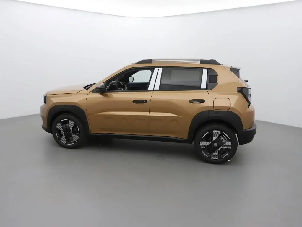 Profil côté gauche de la FIAT Grande Panda 1.2 Hybrid 2025 en bronze luna avec jantes noires et toit ouvrant.