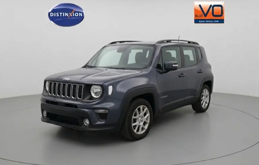 Jeep Renegade bleu en 3/4 avant droit, avec barres de toit et jantes alliage 17 pouces visibles.