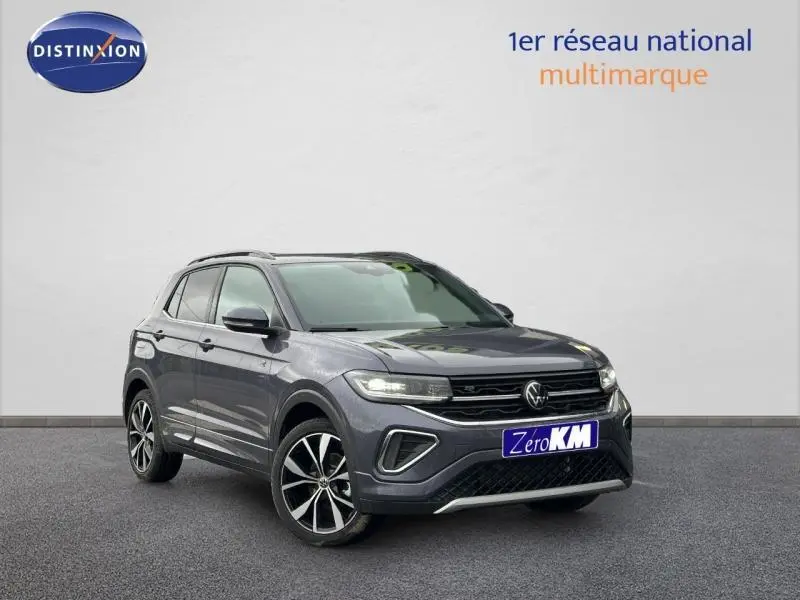 Volkswagen T-Cross 1.0 TSI R-Line gris, vue 3/4 avant avec jantes alliage et calandre noire distinctive.