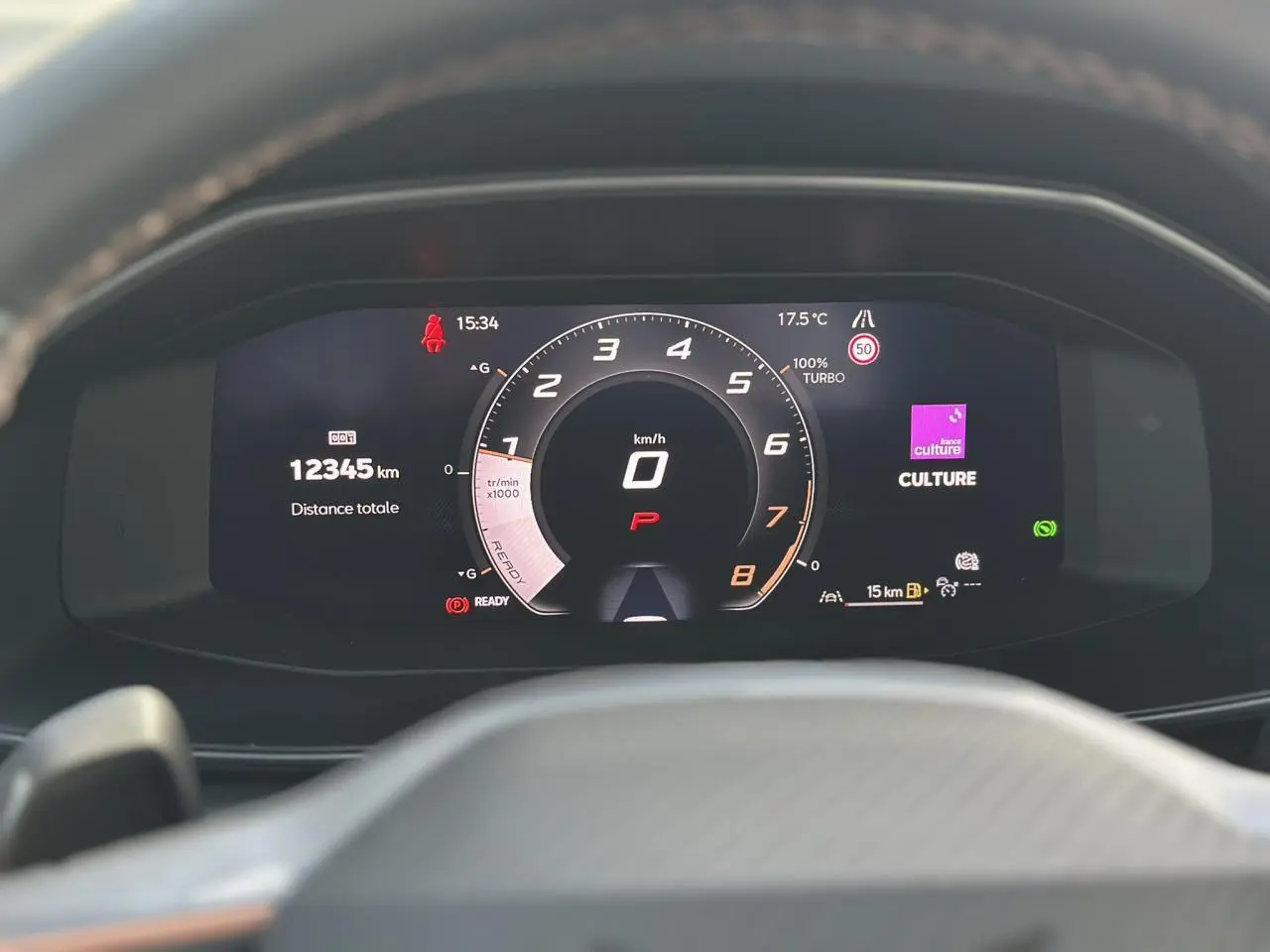 Tableau de bord numérique du CUPRA Formentor 2025 affichant la vitesse à 0 km/h et 12 345 km au compteur.