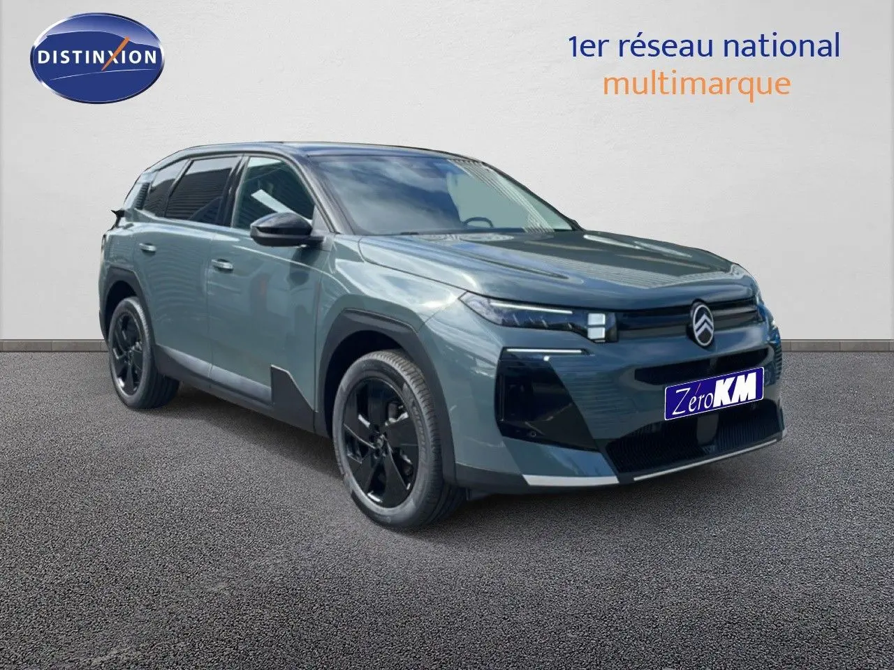 Citroën C5 Aircross Hybrid vert Astoria métal en vue 3/4 avant droit avec jantes noires et calandre distinctive.