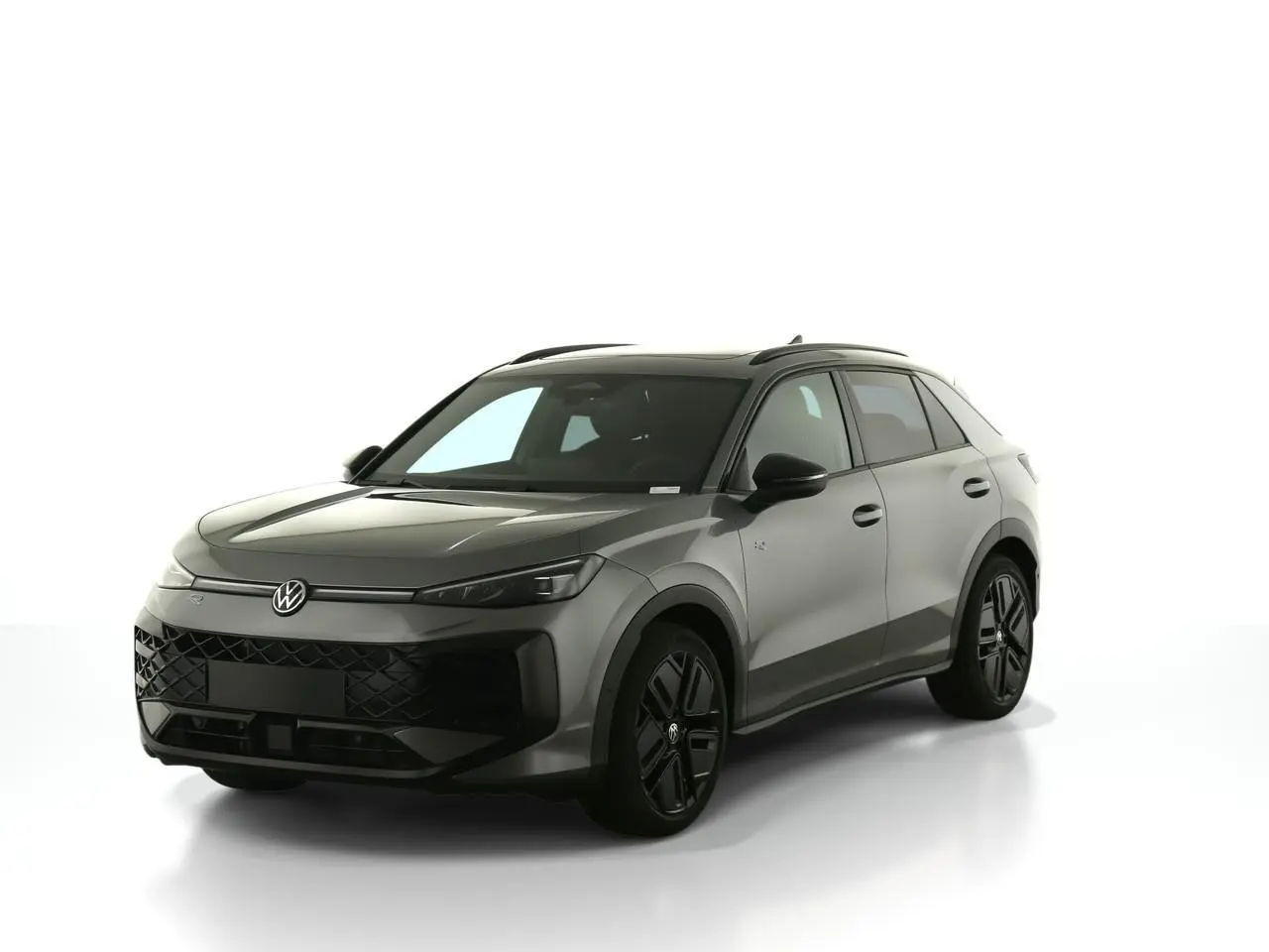 Volkswagen T-Roc gris Loup en 3/4 avant droit avec jantes noires et toit noir brillant sur fond blanc.