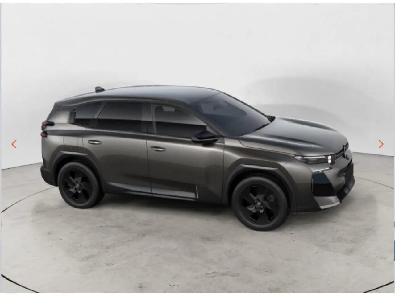 Vue de profil côté gauche du Citroën C5 Aircross gris avec jantes noires et vitres teintées.