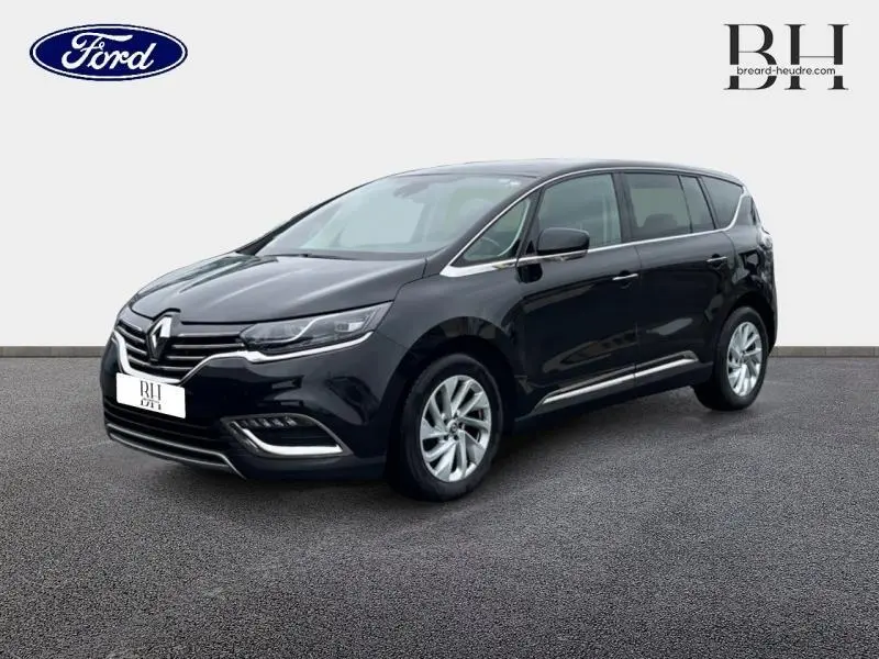 Renault Espace noir étoilé en vue 3/4 avant droit, avec jantes alu et calandre chromée distinctive.