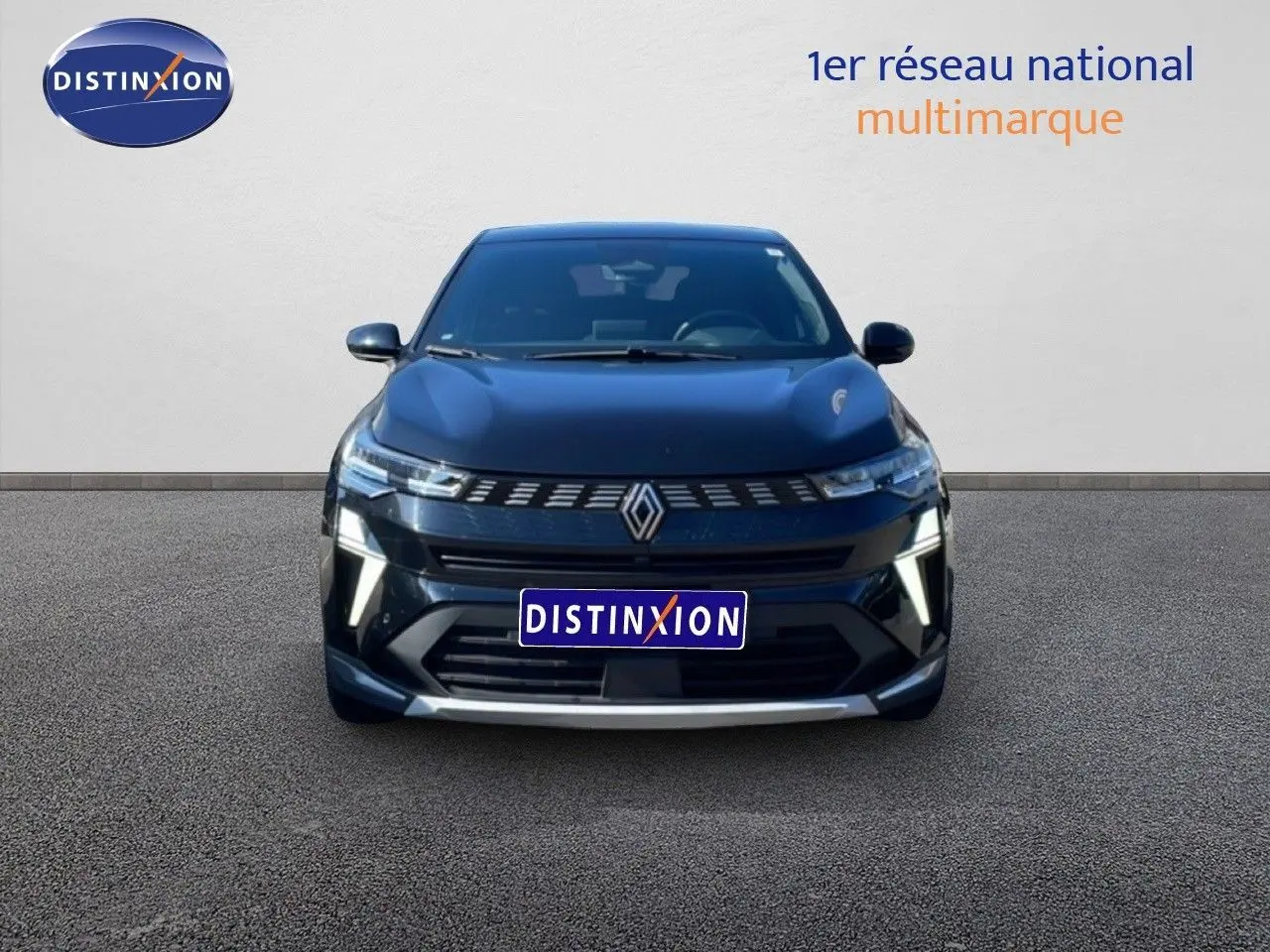 Vue avant d'une Renault Symbioz noire étoile métal avec calandre distinctive et éclairage LED vertical.