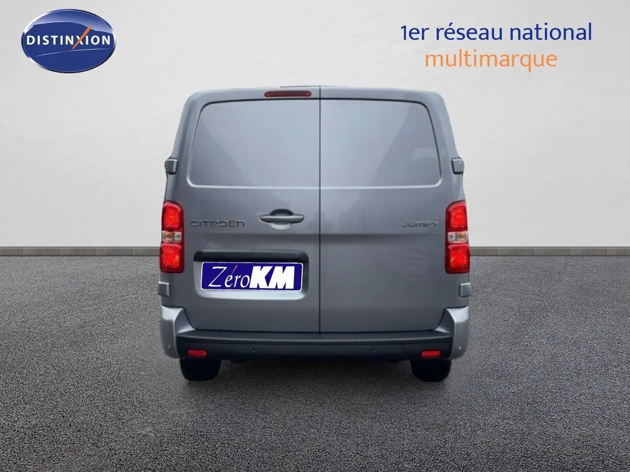 Vue arrière du Citroën Jumpy Van Long L3 gris Artense métal avec portes battantes et feux rouges visibles.