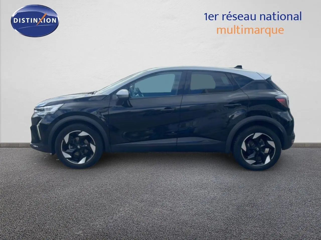 Renault Captur 2025 noir étoile métal avec toit gris, vue profil côté gauche sur fond neutre.