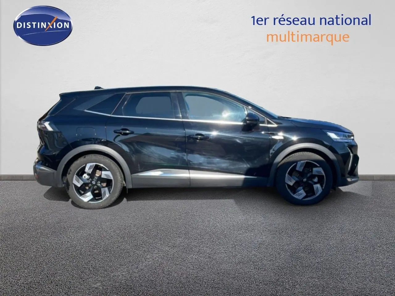 Renault Symbioz noir étoile métal vu de profil côté gauche, avec jantes au design moderne et lignes épurées.