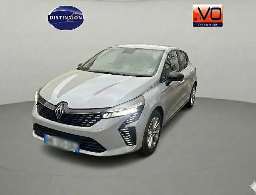 Renault Clio V Blue dCi gris vue 3/4 avant droit, avec phares LED et calandre noire distinctive.