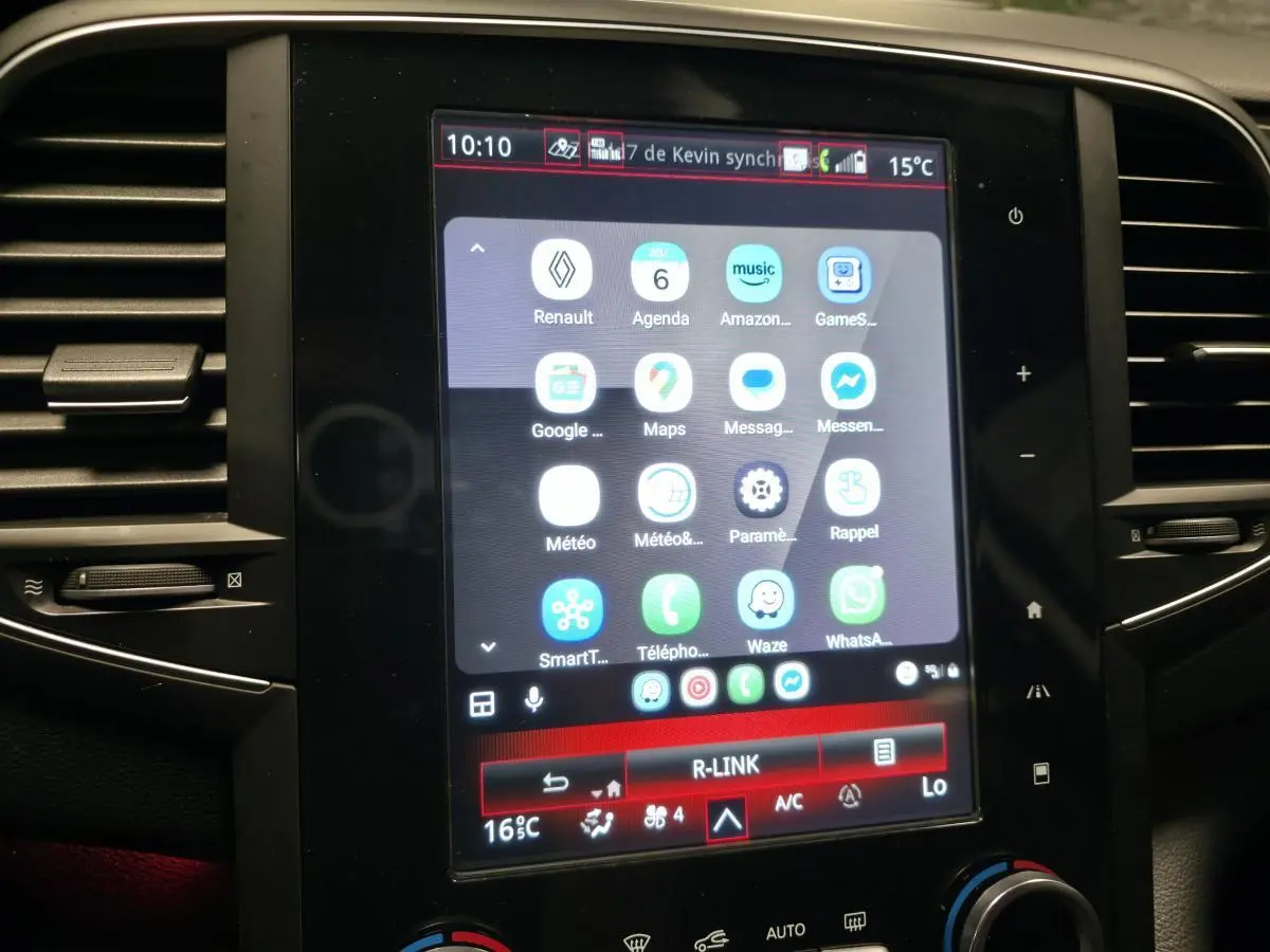 Écran tactile R-Link 8,7 pouces de Renault Talisman Estate gris, affichant applications connectées et commandes climatisation.