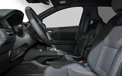 Intérieur avant droit du Renault Captur 2025, sièges gris avec coutures, volant et console centrale visibles.