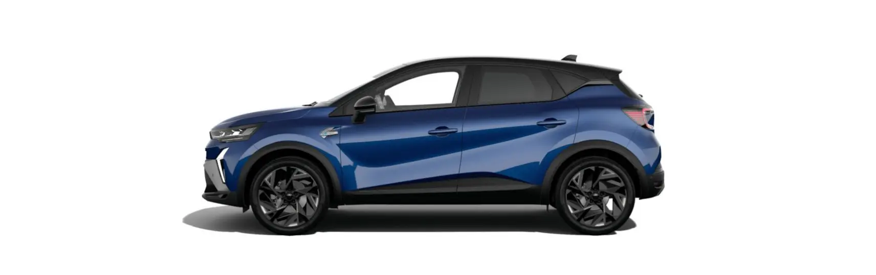 Profil droit du Renault Captur 2025 bleu Iron avec toit noir étoilé et jantes noires distinctives.