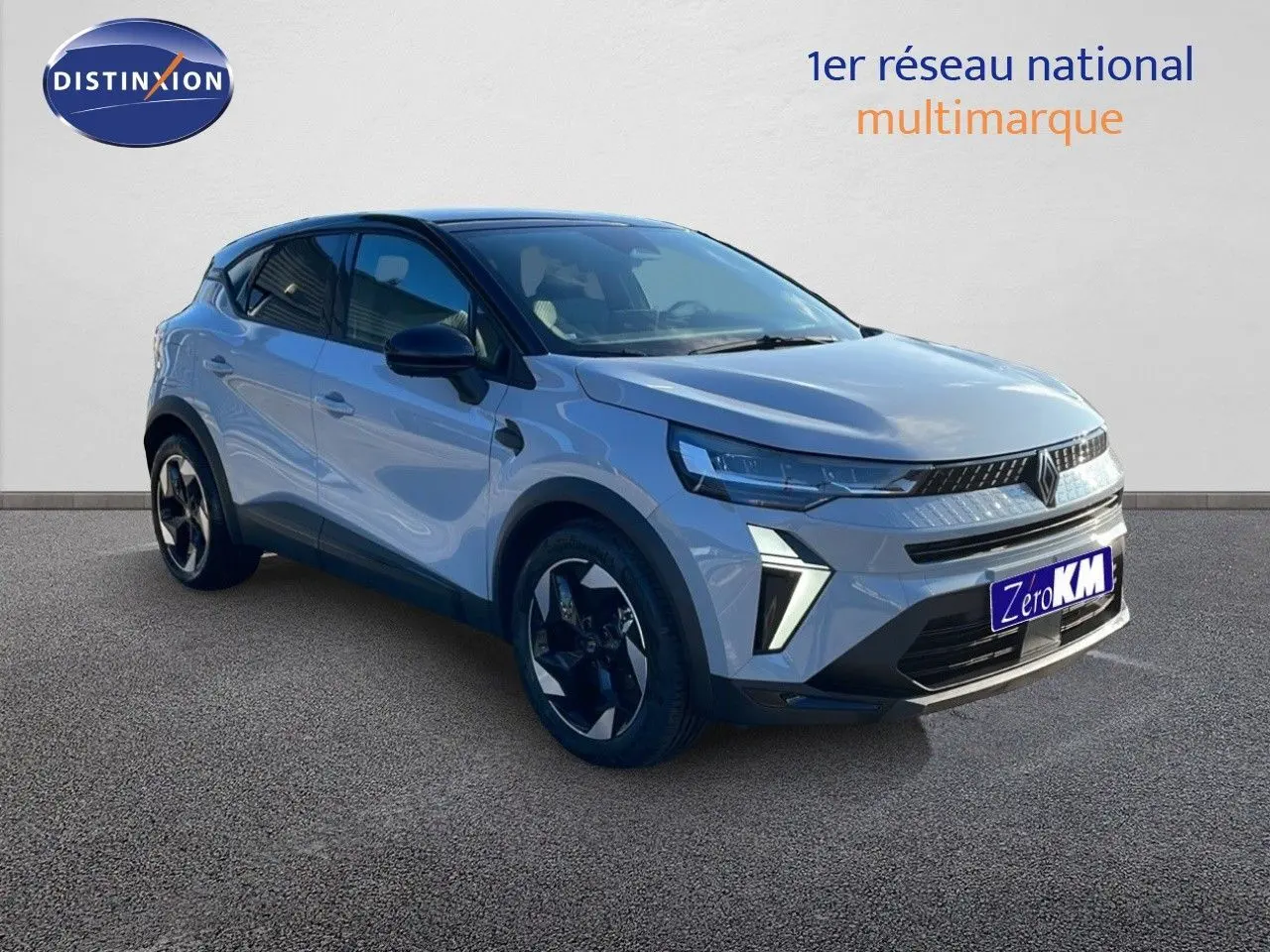 Renault Captur E-Tech hybride gris Rafale métal avec toit noir, vu en 3/4 avant droit sur fond neutre.