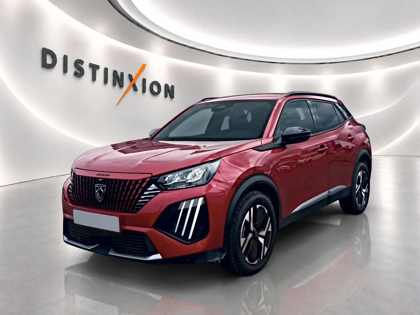 Peugeot 2008 rouge elixir vue 3/4 avant droit avec calandre noire et feux LED distinctifs.