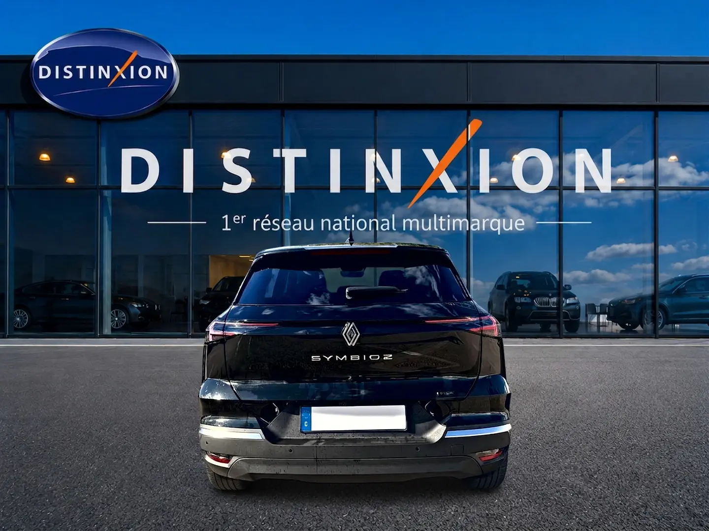 Vue arrière d'un Renault Symbioz noir étoile 2026, avec feux arrière LED et logo centré sur le hayon.