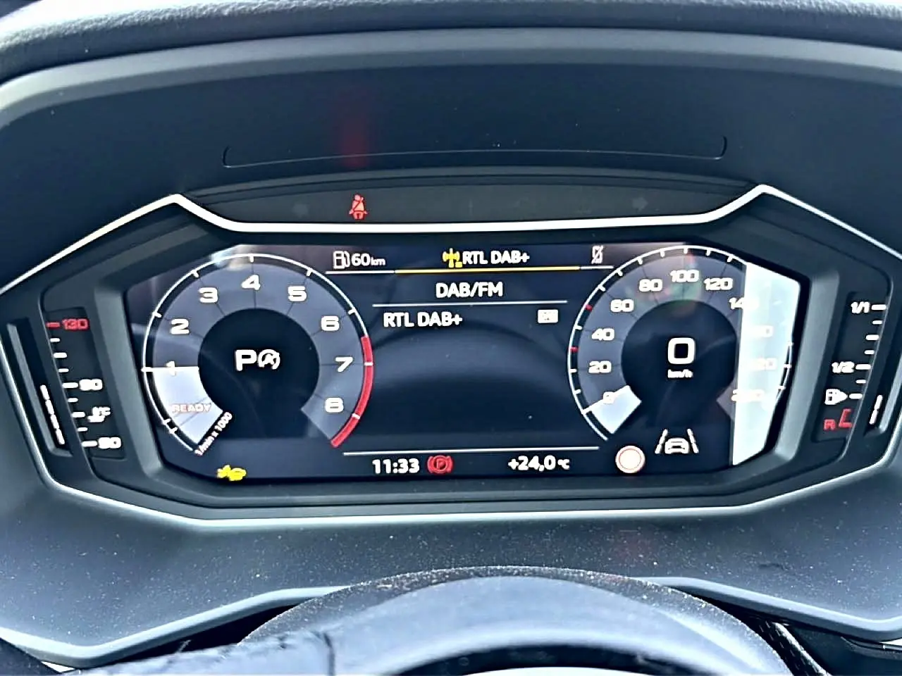 Tableau de bord numérique de l'Audi A1 Sportback 30 TFSI 116 S line 2026 affichant compte-tours et vitesse à 0 km/h.