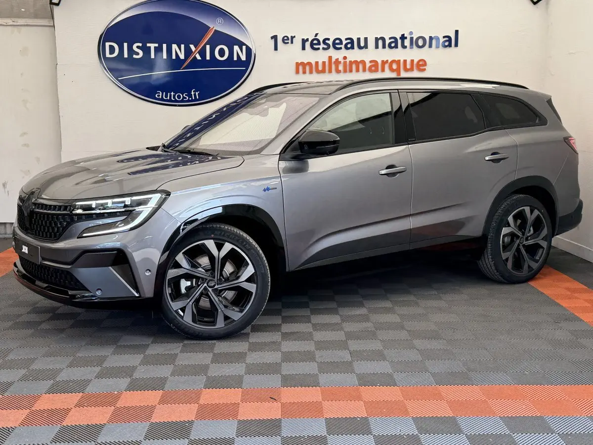 Renault Espace esprit Alpine gris foncé, vue de profil côté gauche, avec jantes distinctives et toit noir.