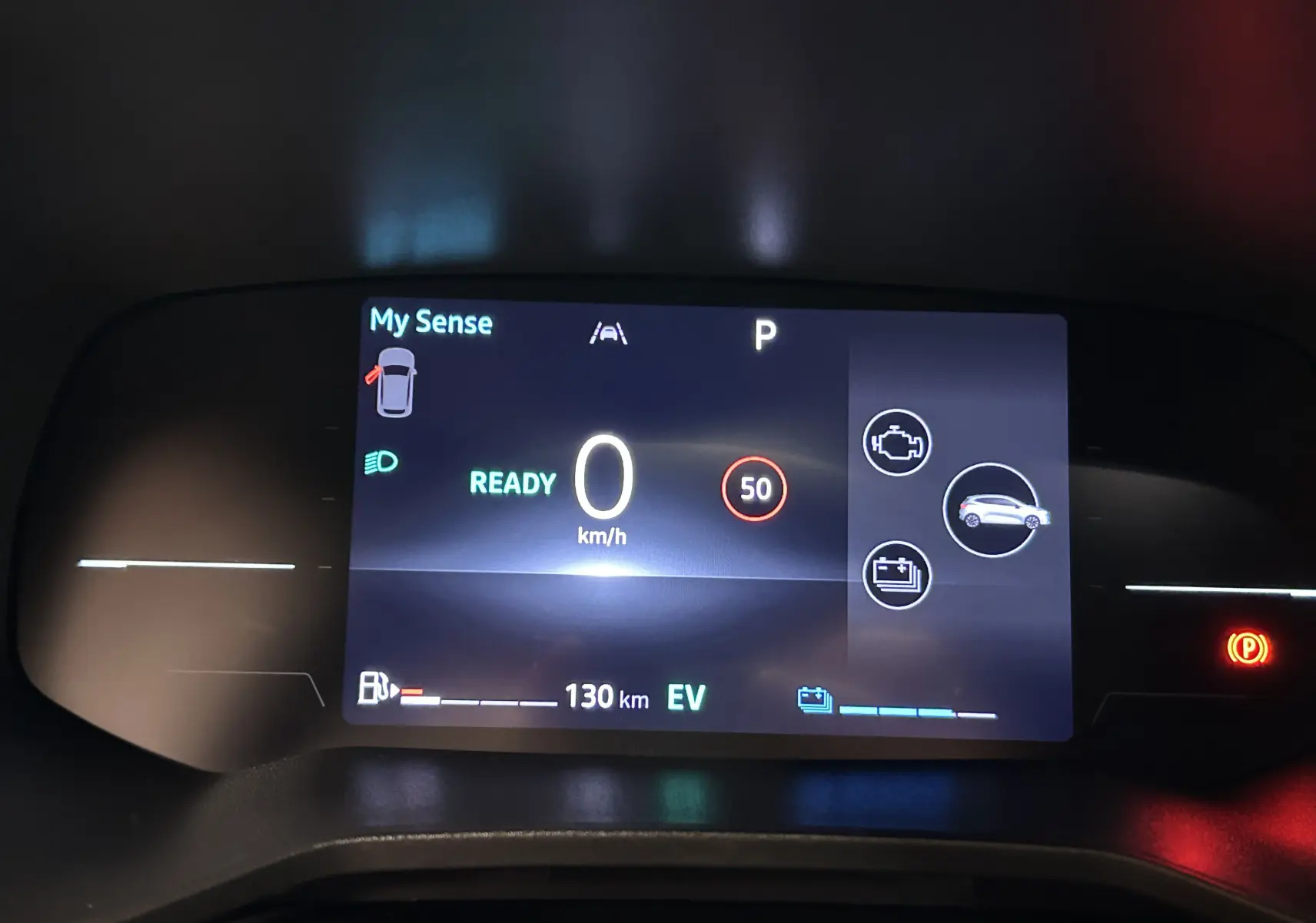 Tableau de bord numérique de Renault Clio V E-Tech 145ch affichant vitesse à 0 km/h et mode prêt, vue frontale.