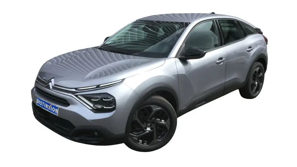 Citroën C4 III gris acier en vue 3/4 avant droit, avec jantes noires et signature lumineuse LED distinctive.