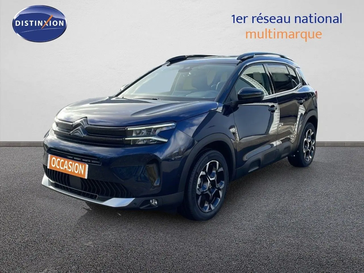 Citroën C5 Aircross bleu Eclipse Metal vue 3/4 avant droit avec jantes bi-ton et toit noir.