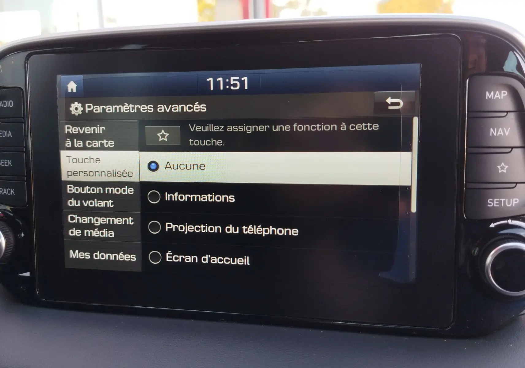 Écran tactile central du Hyundai Tucson 2019 affichant les paramètres avancés de personnalisation des fonctions.
