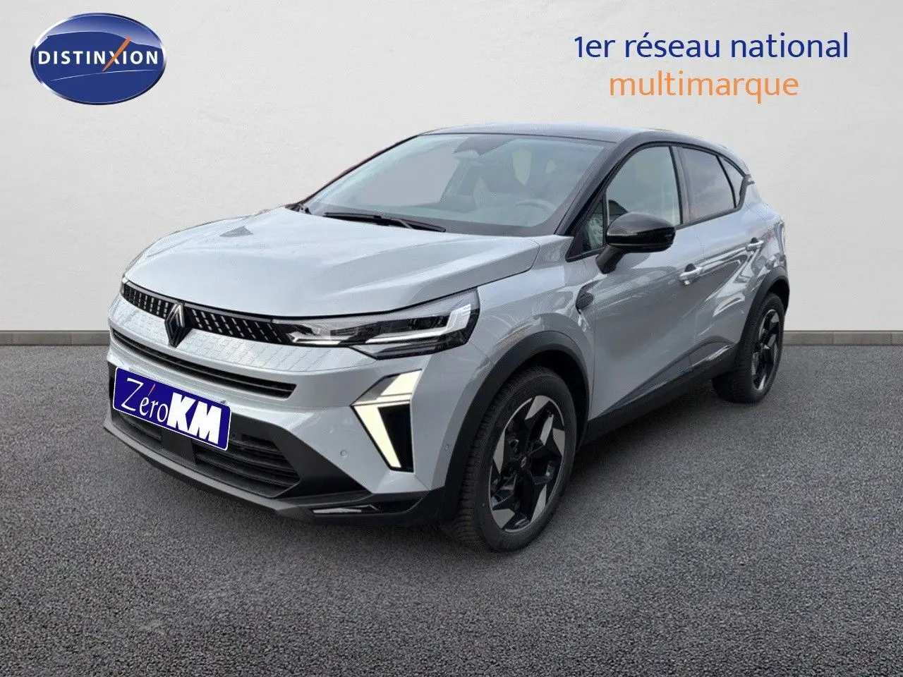 Renault Captur II hybride gris Rafale métal avec toit noir, vue 3/4 avant mettant en valeur les phares LED distinctifs.