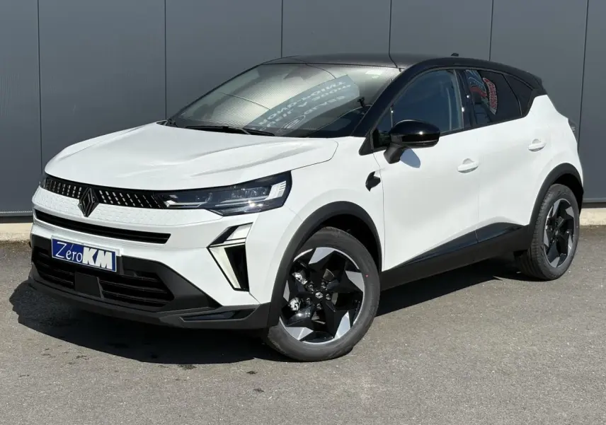 Renault Captur ECO-G 100 Techno blanc nacré vu en 3/4 avant droit avec toit noir étoilé et jantes noires.