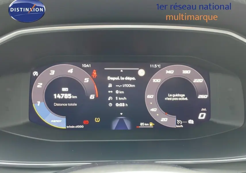 Tableau de bord numérique du SEAT LEON 2.0 TDI 115CH STYLE XL gris, affichant 14 785 km et informations de conduite.