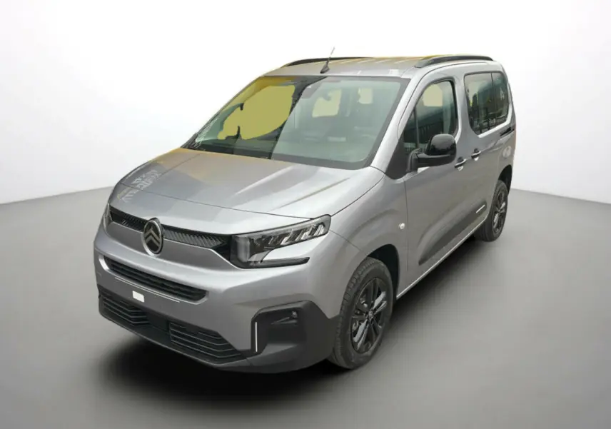 Citroën Berlingo BlueHDi 130 EAT8 Max gris Artense en vue 3/4 avant droit, avec calandre noire et jantes foncées.