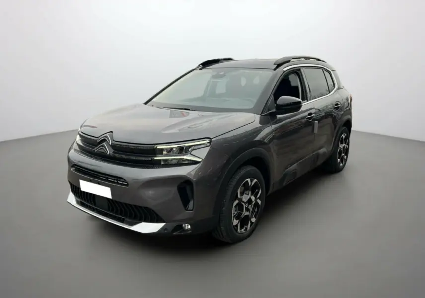 Citroën C5 Aircross BlueHDi 130 2025 gris platinium avec toit noir, vue 3/4 avant côté gauche.