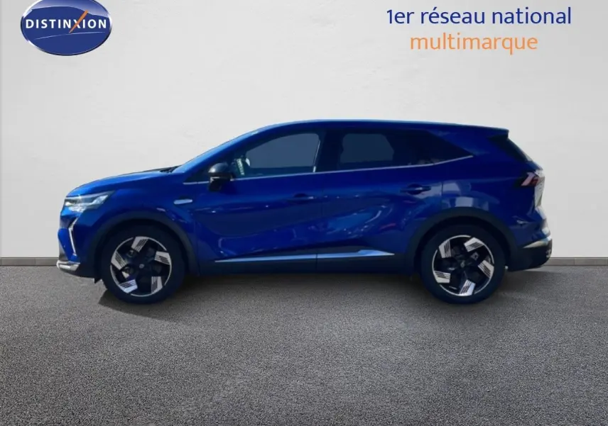 Profil droit du Renault Symbioz 2025 en bleu Iron Metal avec jantes noires et détails modernes.