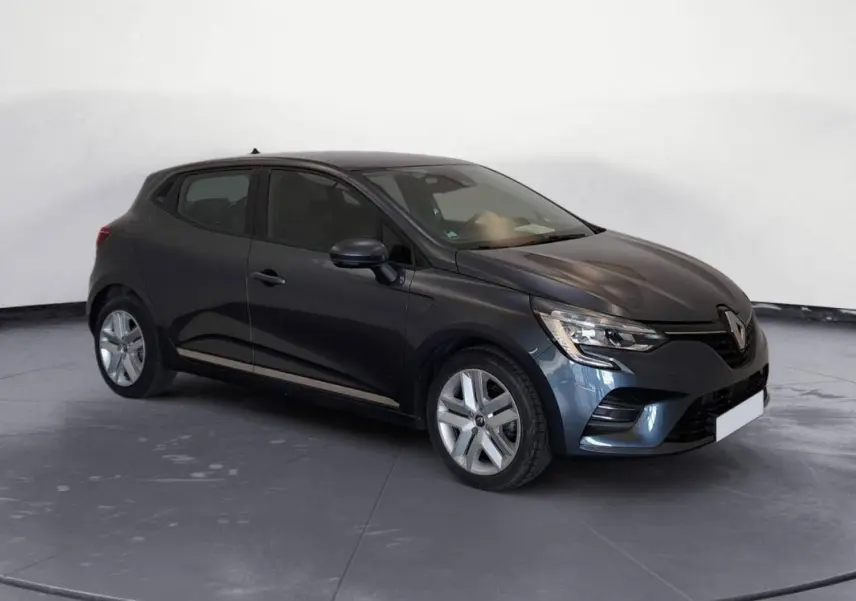 Renault Clio V TCe 100 Business gris foncé vue 3/4 avant droit, avec jantes alliage et phares LED allumés.