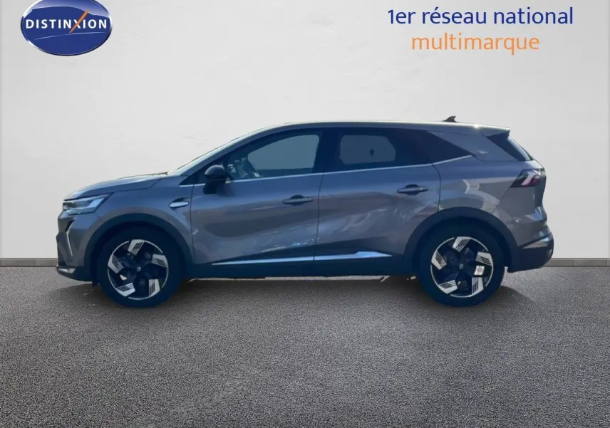 Profil droit du Renault Symbioz gris cassiopée métal 2025 avec jantes bi-ton et lignes dynamiques.
