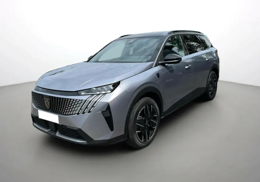 Peugeot 5008 Hybrid gris artense avec toit noir, vue 3/4 avant droit mettant en valeur la calandre distinctive et les jantes noires.