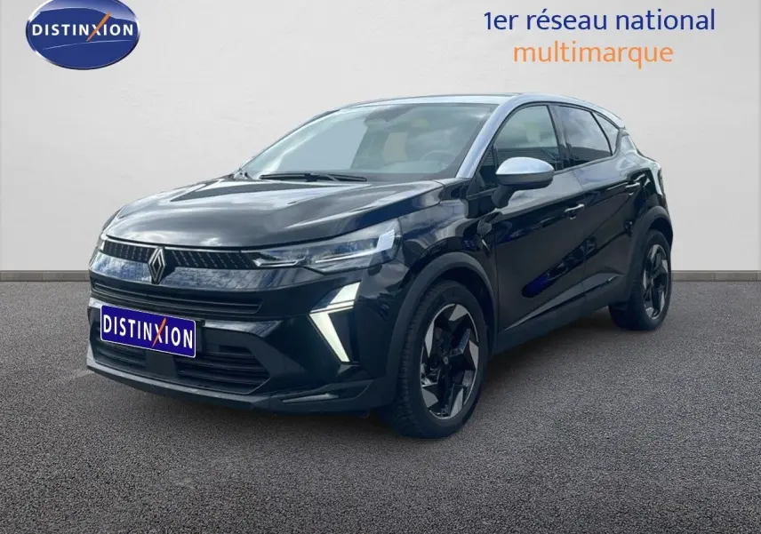 Renault Captur 2025 noir étoile métal avec toit gris, vue 3/4 avant mettant en valeur ses optiques LED et jantes noires.
