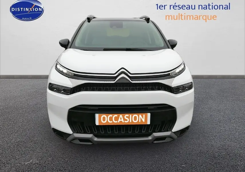 Citroën C3 Aircross blanc polar vue de face avec calandre noire et plaque "OCCASION" orange visible.
