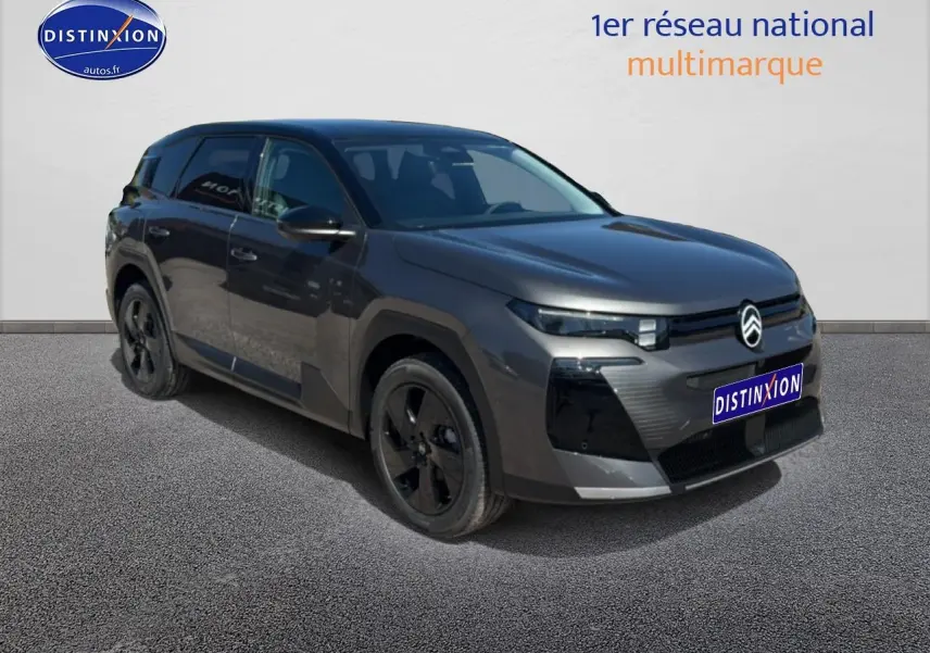 Citroën C5 Aircross gris platinium 3/4 avant droit, toit noir bi-ton et jantes alliage noires.